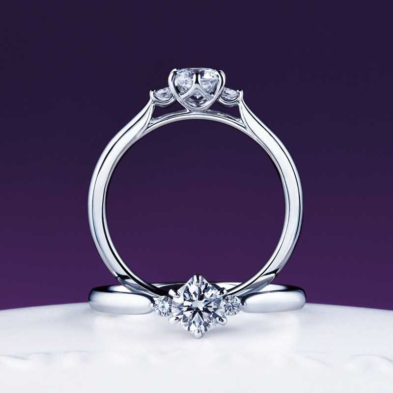 新潟で人気の結婚指輪と婚約指輪 にわか(ニワカ) | ダイヤモンドを包み込む丸みのある婚約指輪 -寄り添い微笑む純白のすずらん-